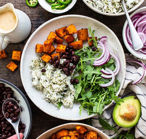 overhead of roasted sweet potato black bean bowll