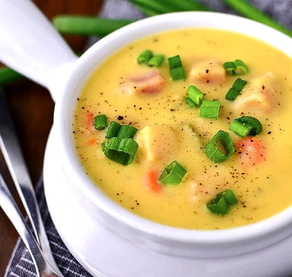 bowl of cheesy ham and potato soup