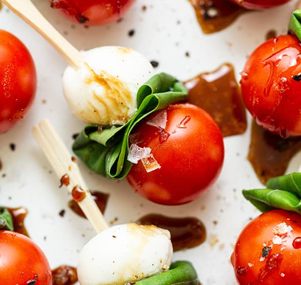 caprese skewers on platter