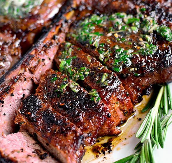 sliced grilled steak on a plate