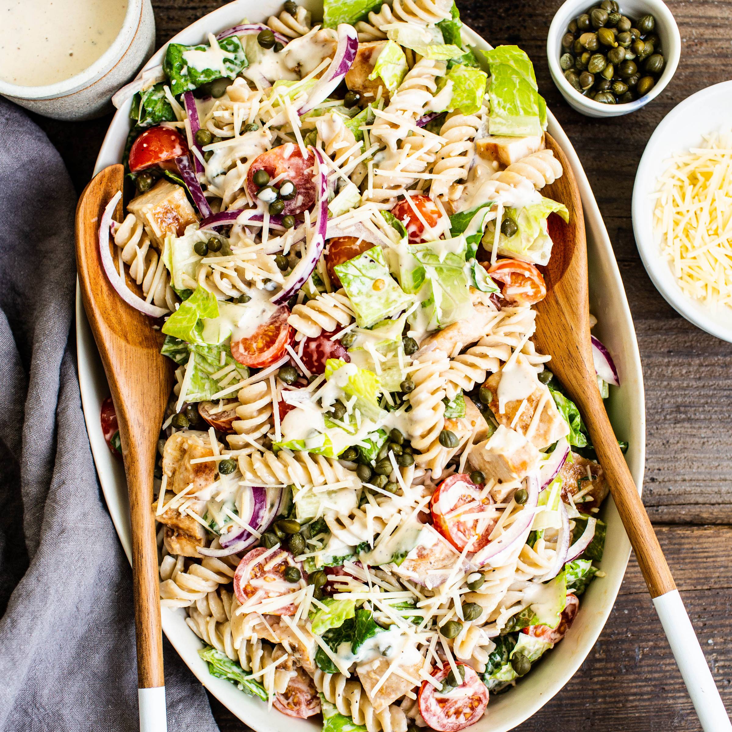 platter of chicken caesar salad pasta