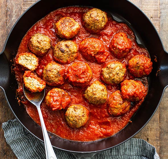 overhead of skillet of chicken meatballss