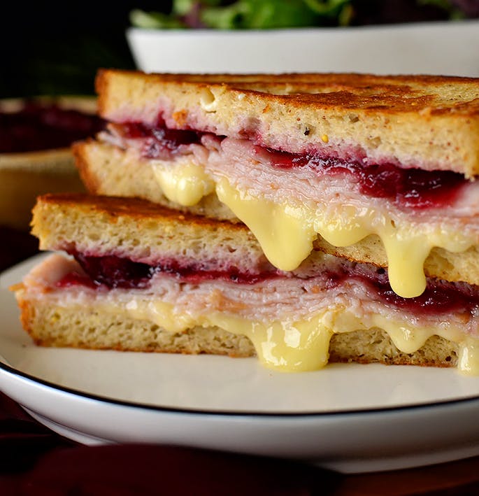 Holiday Grilled Cheese Sandwich Sliced in half
