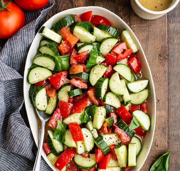 platter of cucumber tomato salad