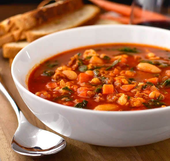 bowl of italian sausage spinach and tomato soup