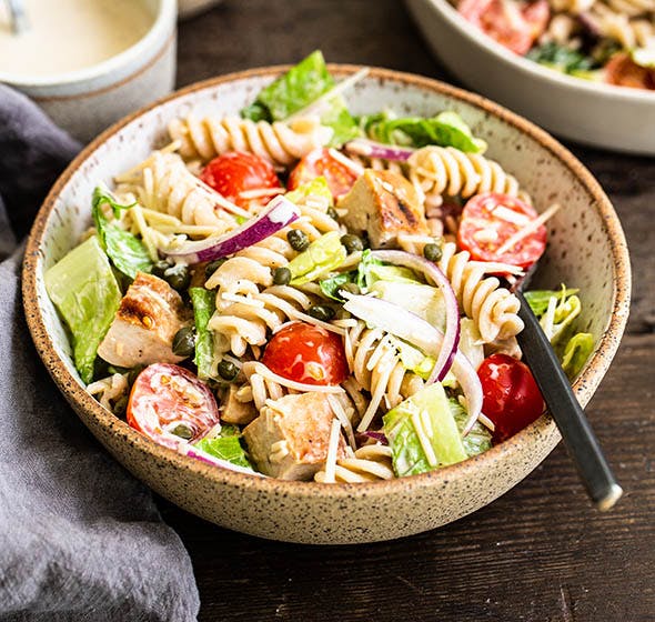 bowl of chicken caesar salad pasta