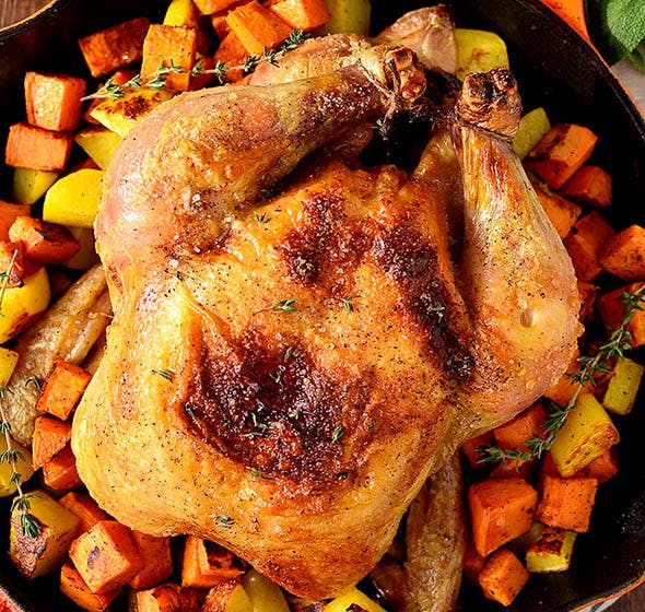 overhead photo of cast iron chicken