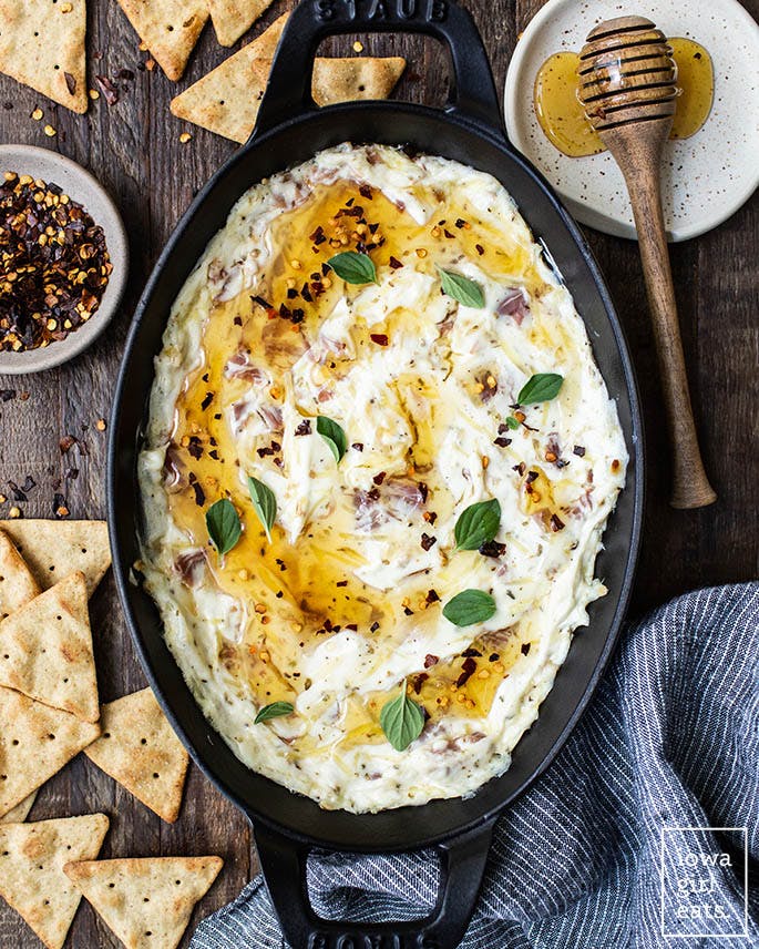 baking dish with roasted garlic prosciutto dip