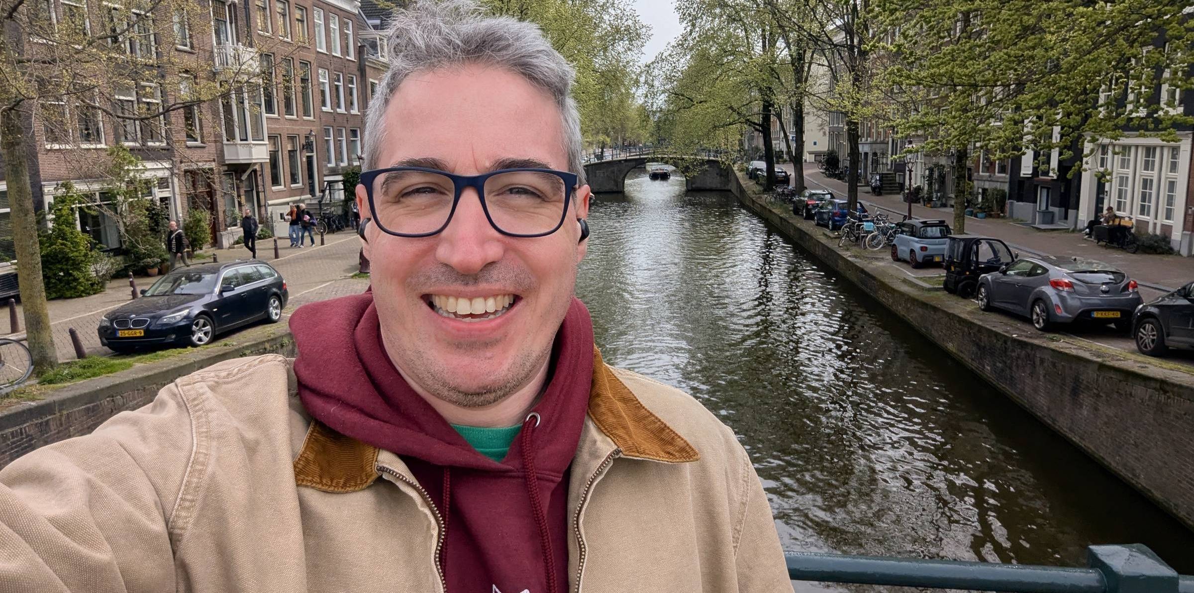 Selfie, standing in front of a canal in Amsterdam