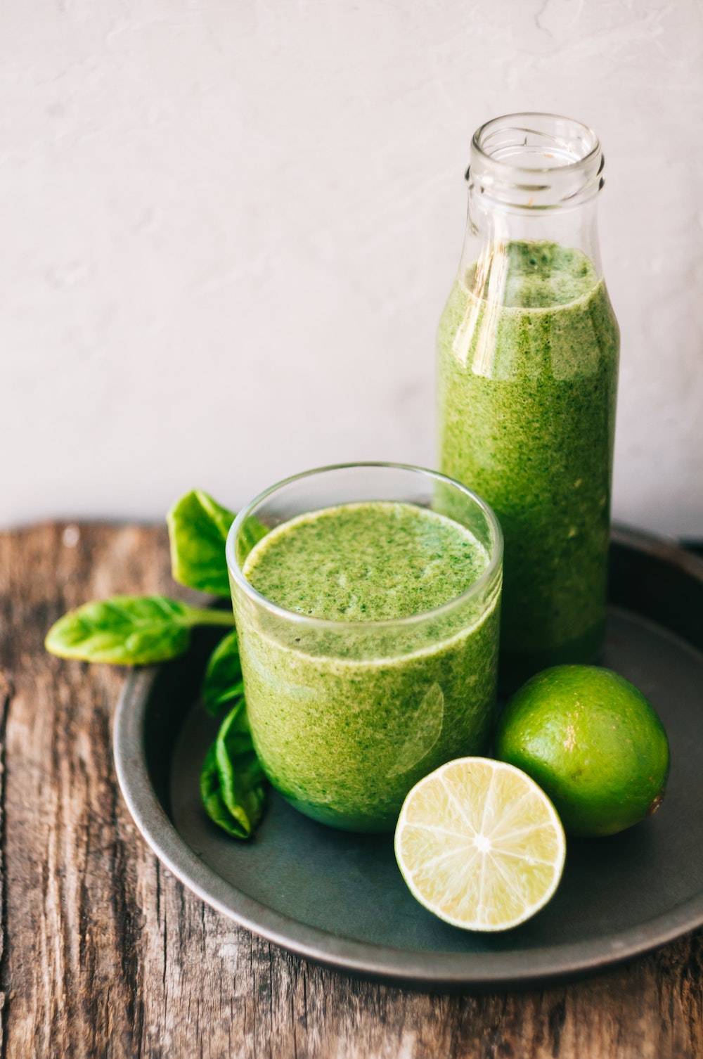 green liquid in clear drinking glass