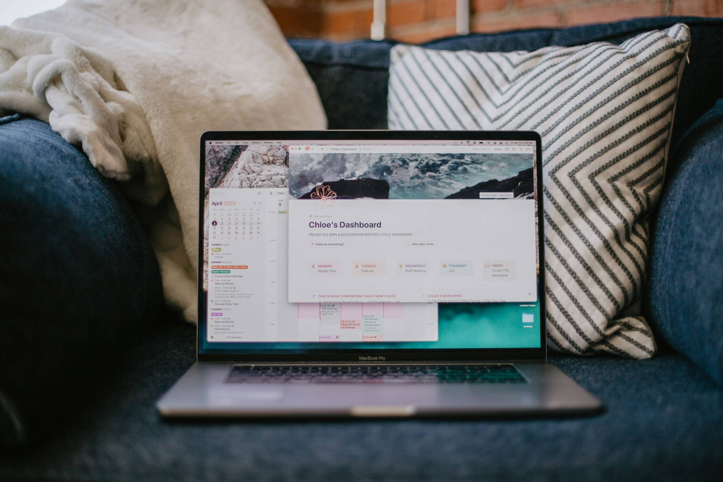 Laptop with a calendar and notion board open