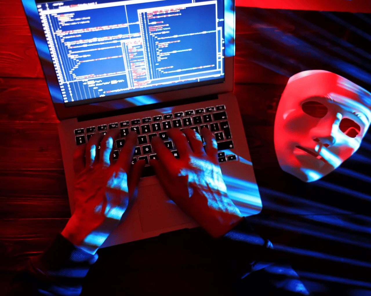 Laptop with someone typing