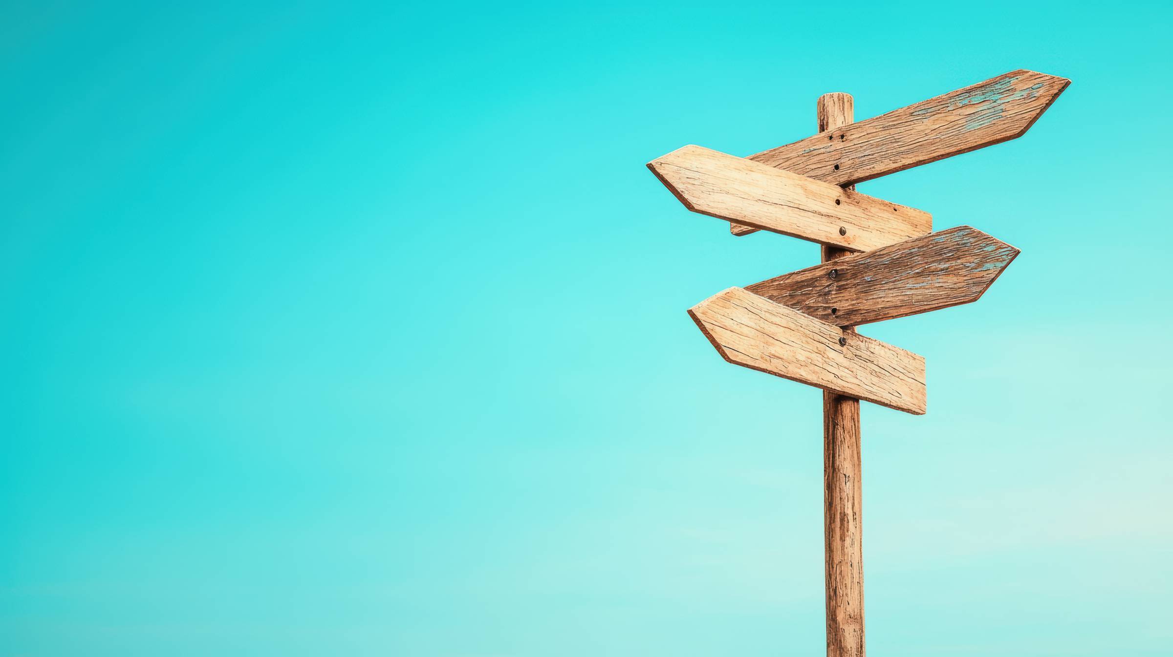 An image of a signpost pointing in different directions by MAY on Adobe Stock