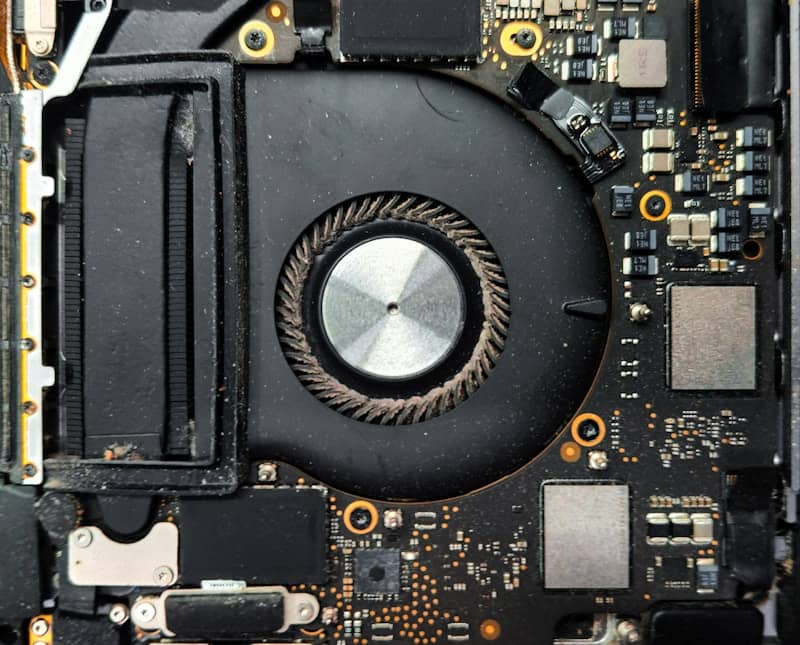 Close-up of a computer fan and circuit board