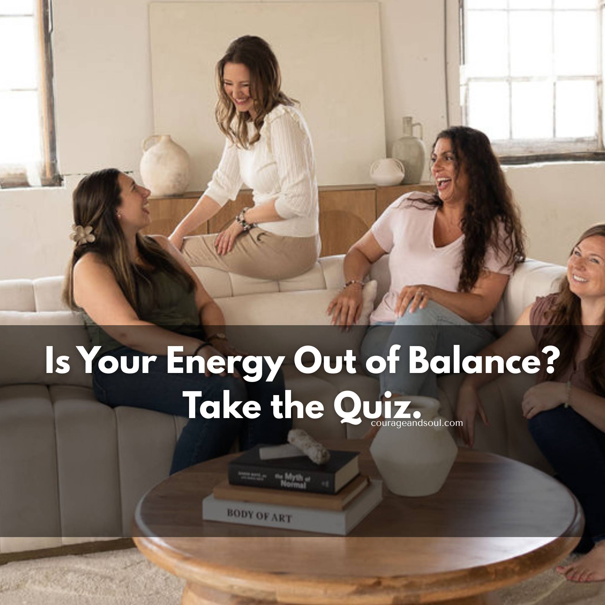 Group of women chatting and laughing, sitting on a couch in a well lit room, spending time with Michelle Hewson - Reiki Master Teacher