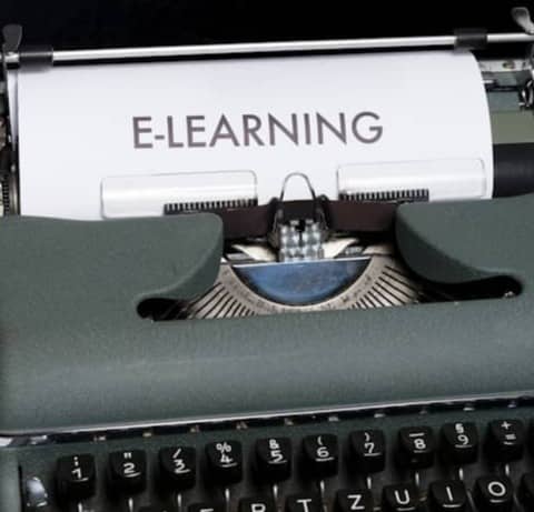 green and white braille typewriter