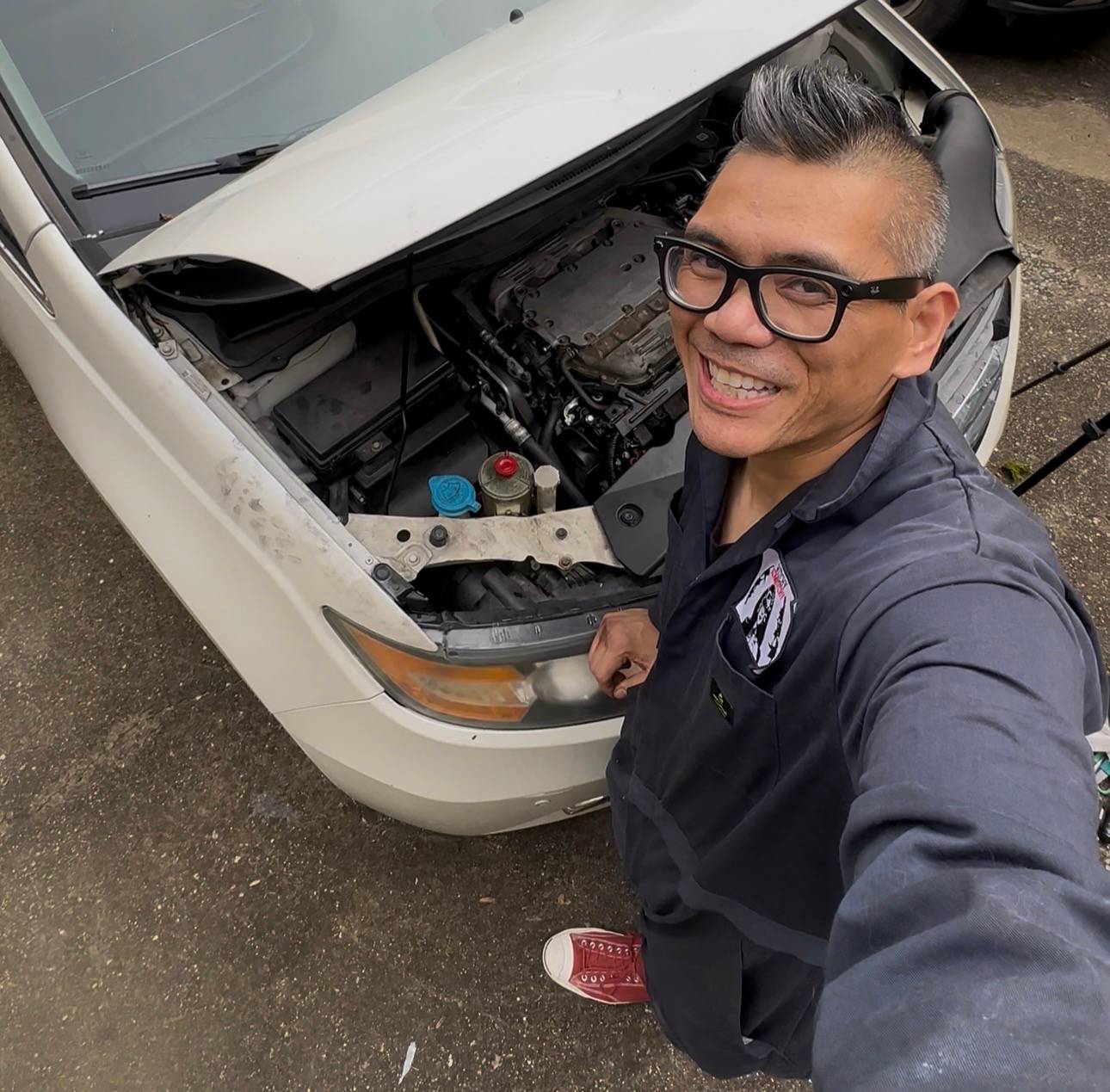 mark fixing cars