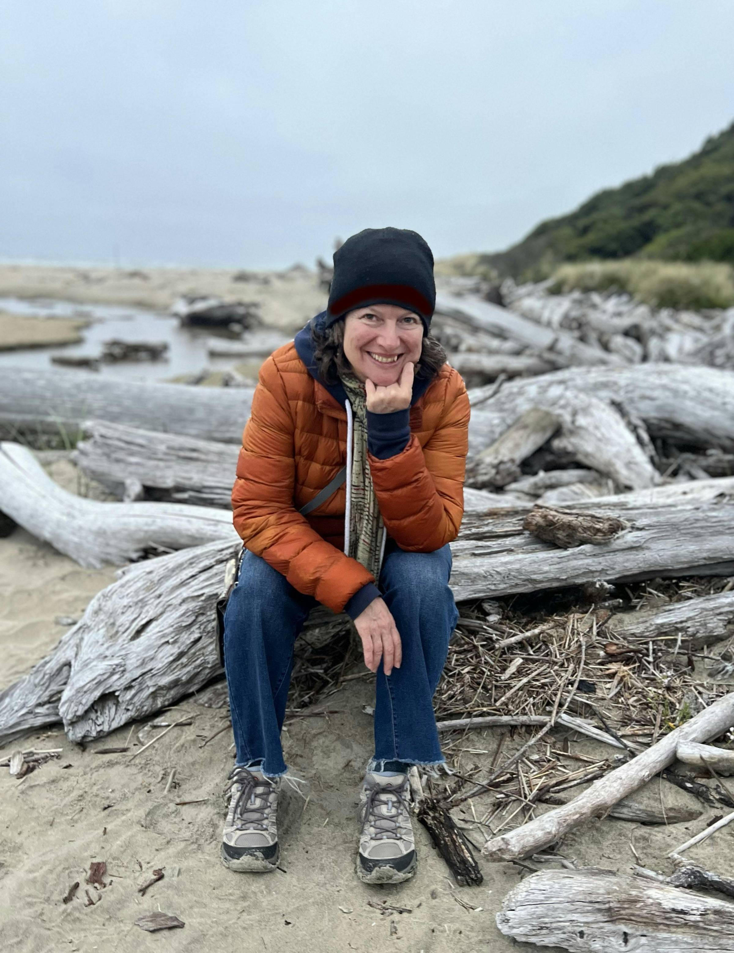 Woman near a river with sun on face