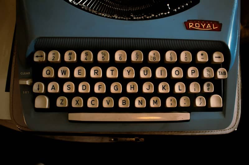 A vintage blue royal typewriter keyboard.