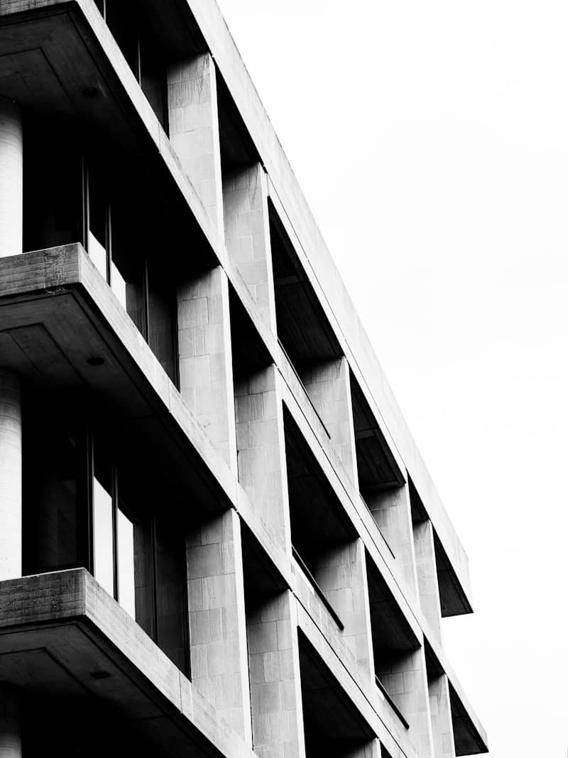 Modern concrete building with repeating window patterns