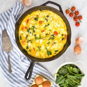 Tomato and Spinach Frittata in a skillet