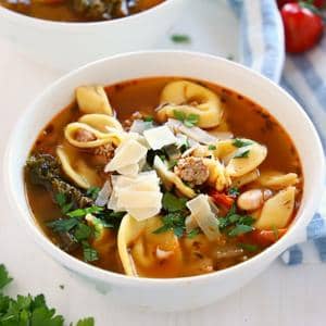 Bowl of rustic Italian sausage tortellini soup