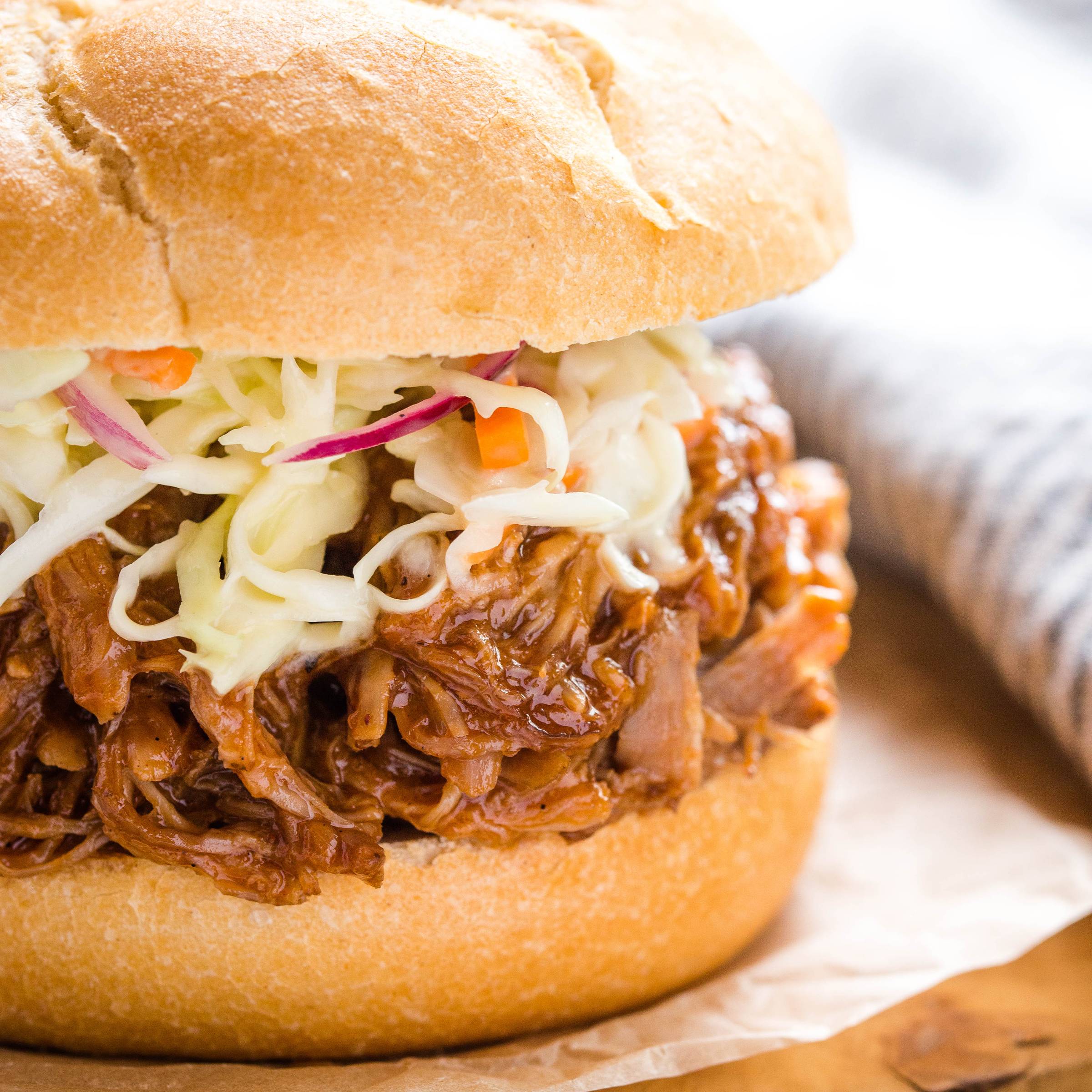 pulled pork on a bun with coleslaw