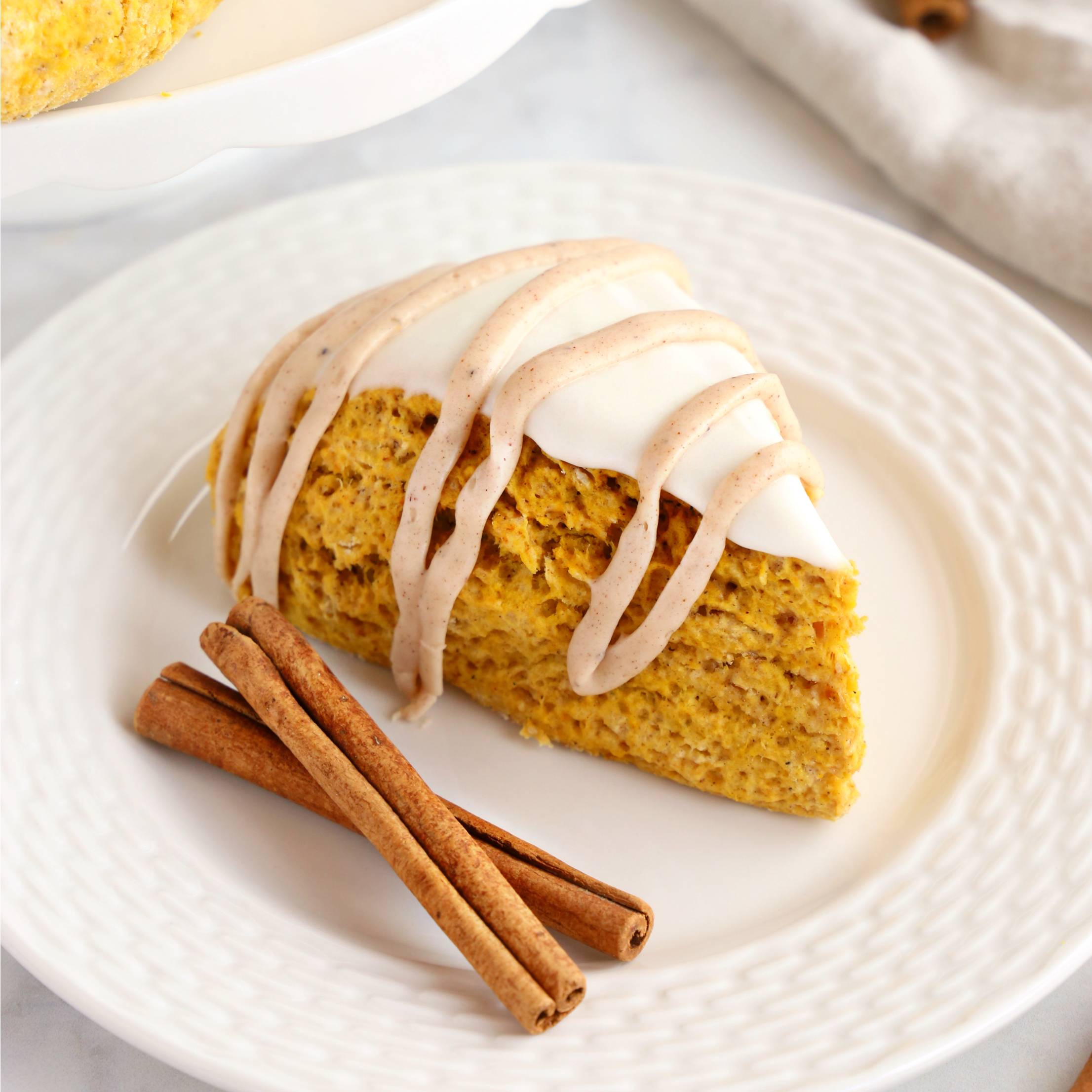 a pumpkin scone on a plate