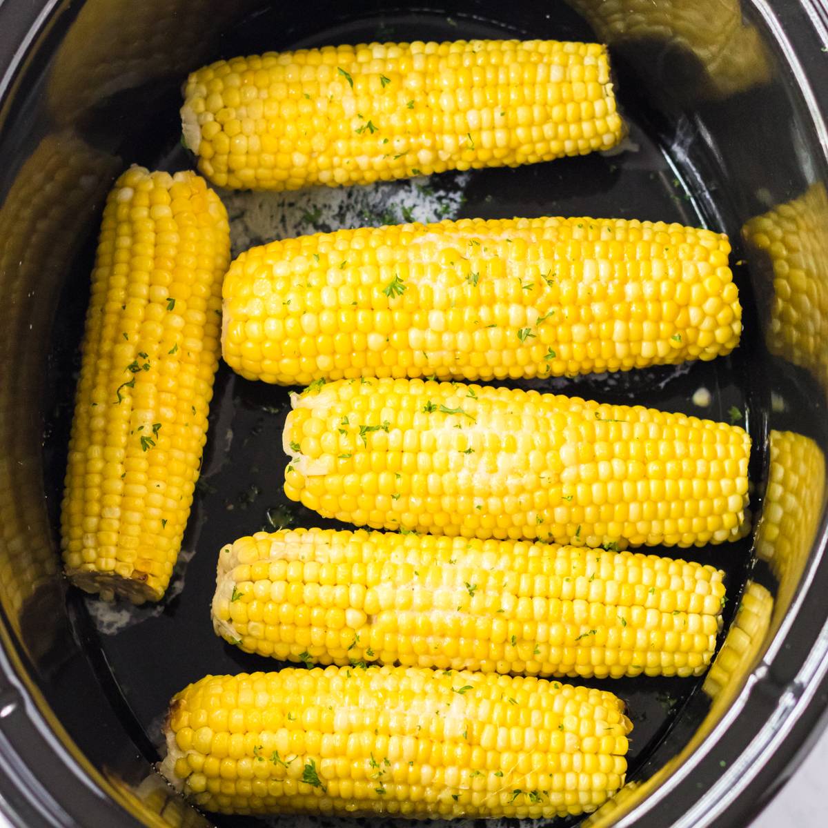 Corn on the cob in the slow cooker.