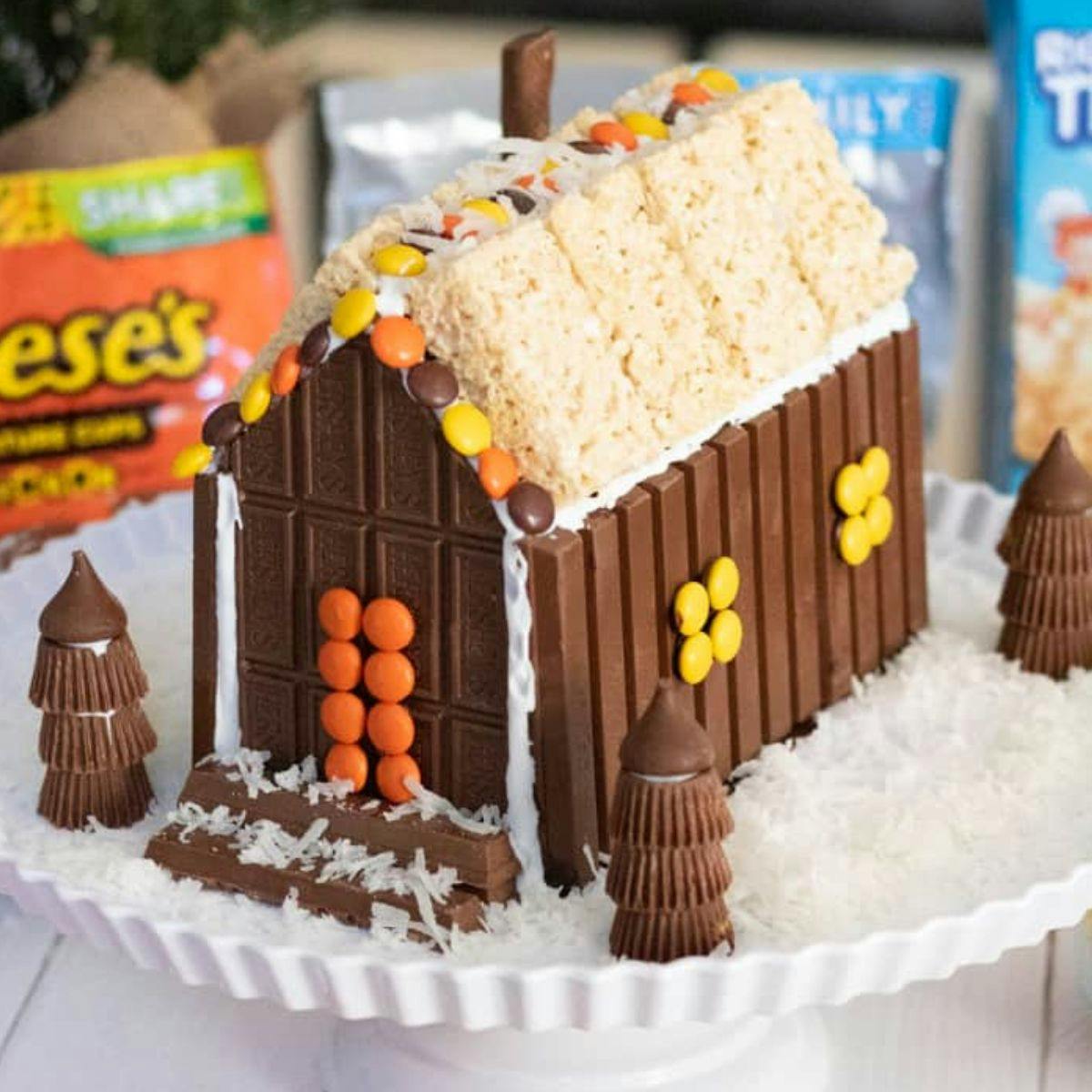 Cabin made out of chocolate and rice krispie treats.