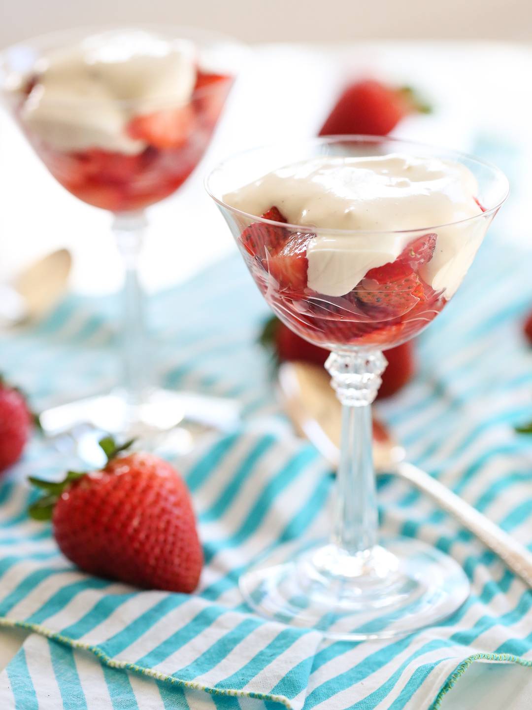 strawberries and cream in glass cups