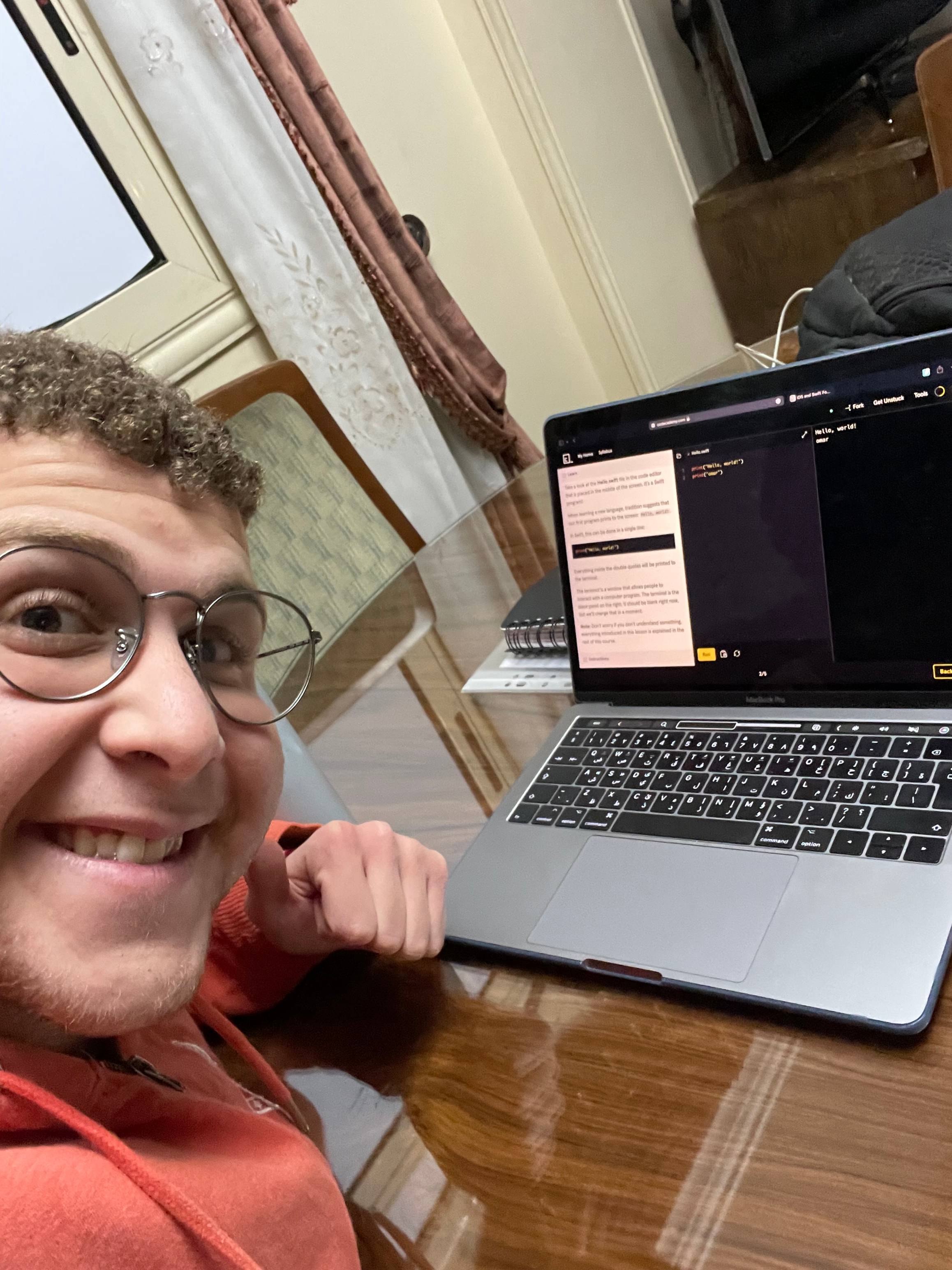 Picture of Omar Elsayed learning swift and talks about the key to growth.