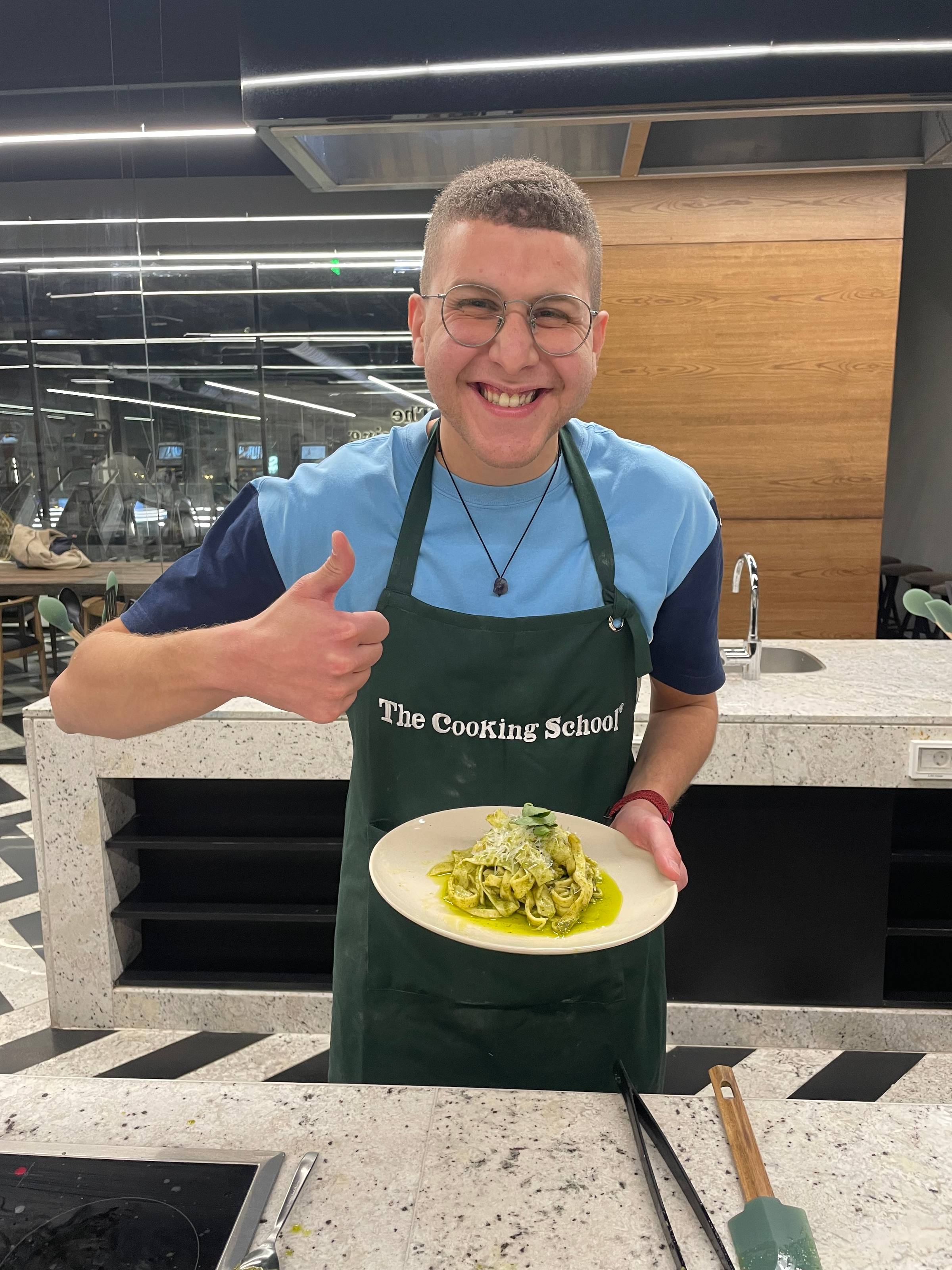 Omar Elsayed taking classes at The Cooking School
