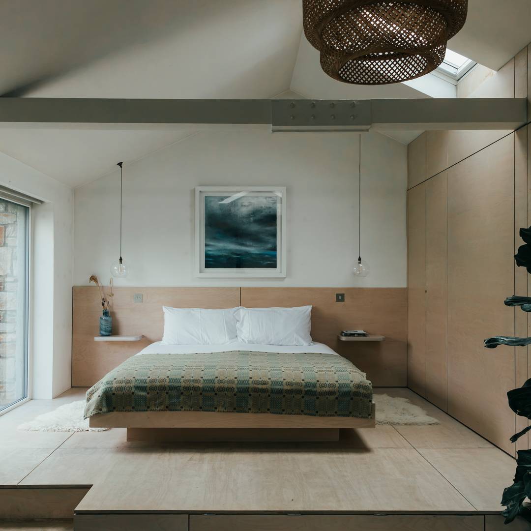 bed on sleeping platform (+ trundle below)