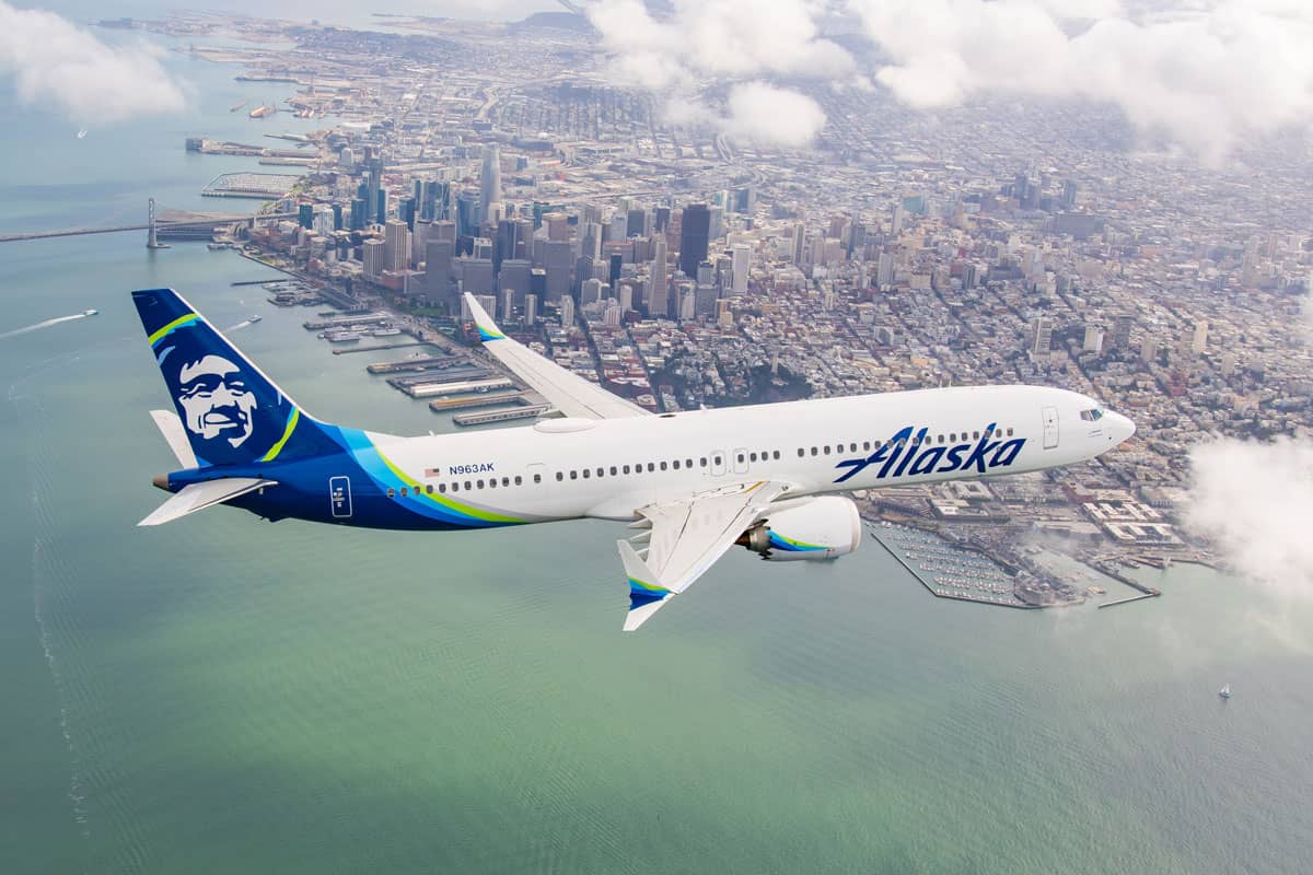 An Alaska Airlines plane flies over New York City.