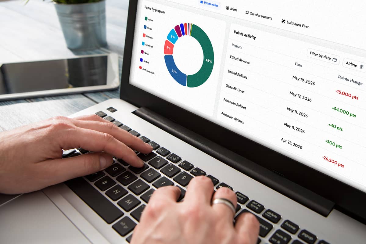 The new Points Path Points Wallet dashboard on a laptop screen with hands typing.