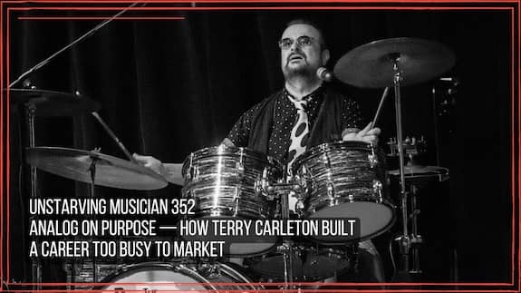 Terry Carleton playing drums at a show for The Reunion, Beatles tribute band.
