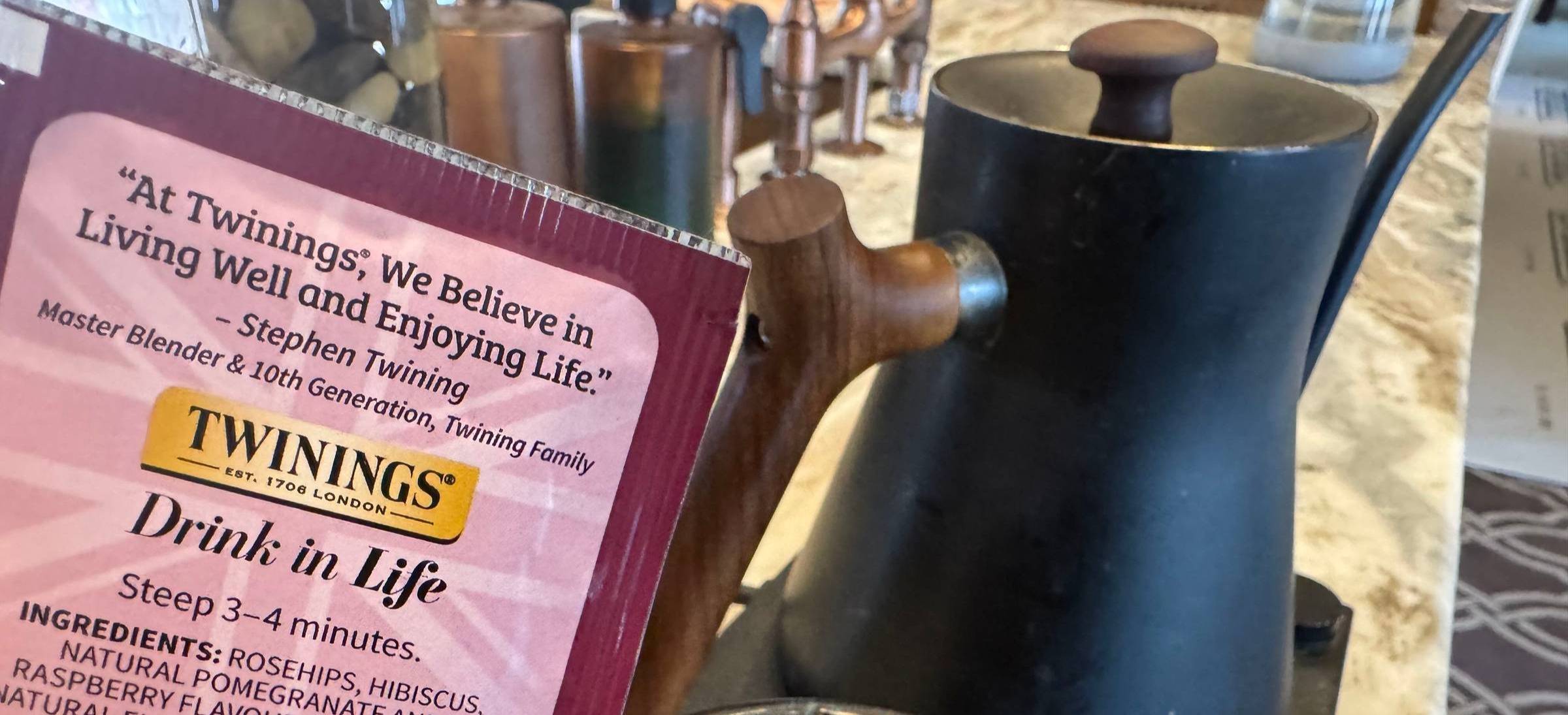 tea pot and the corner of a tea bag