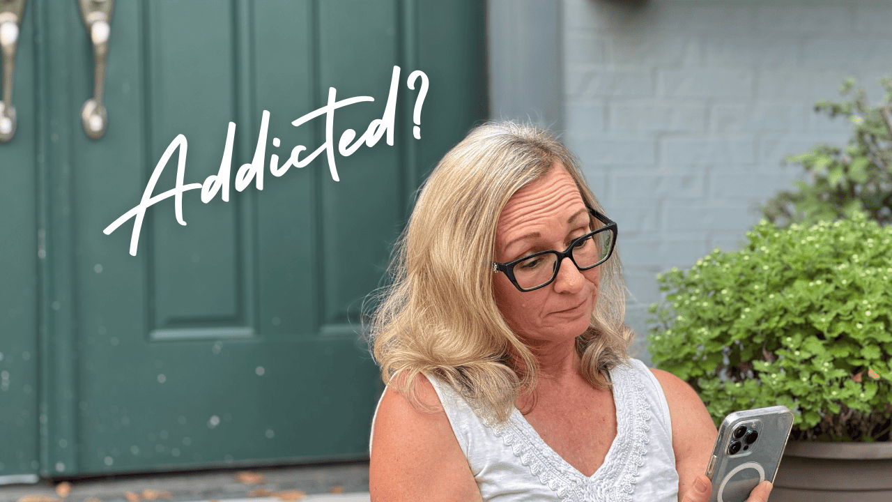 Woman contemplating her wireless phone