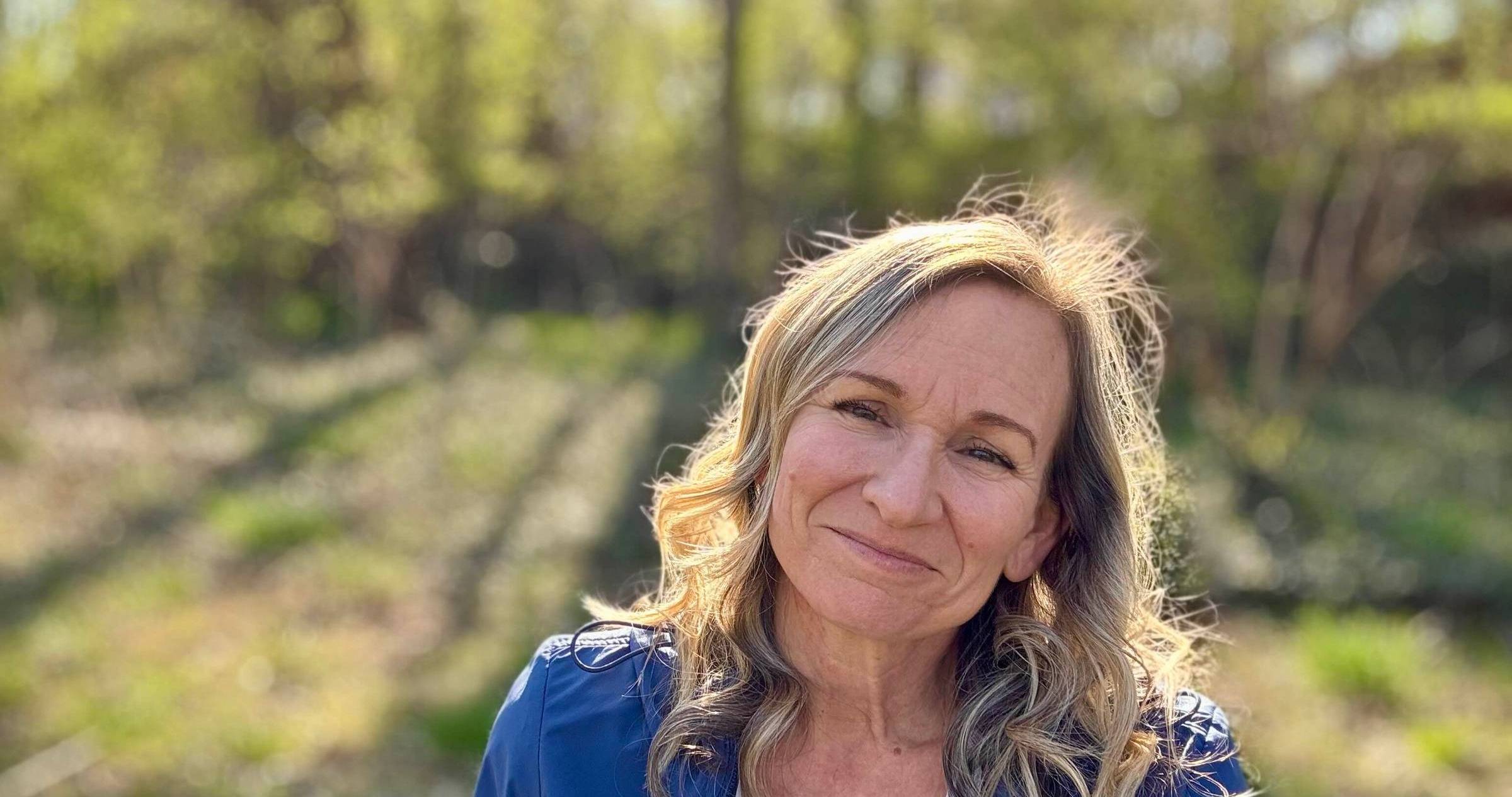 woman outside smiling