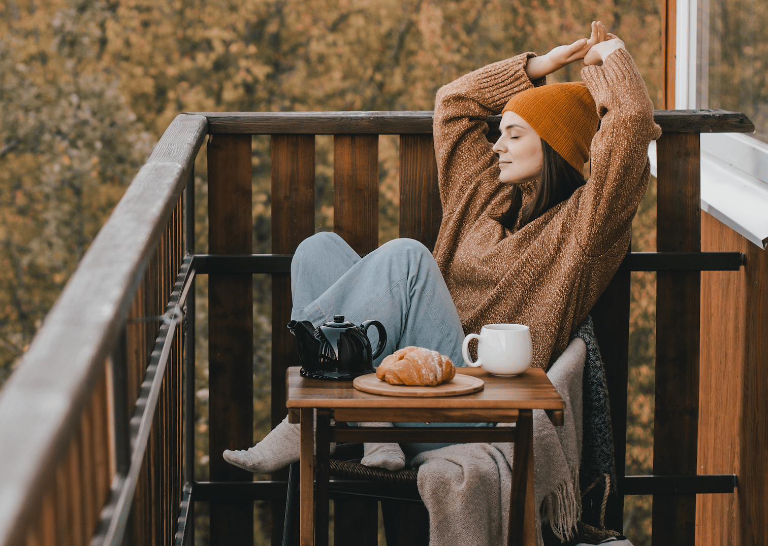 woman relaxing on deck in Autumn