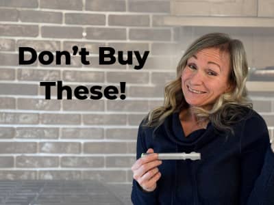 woman holding a fruit zester