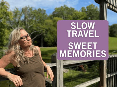 relaxed woman leaning against wood railing enjoying sunshine