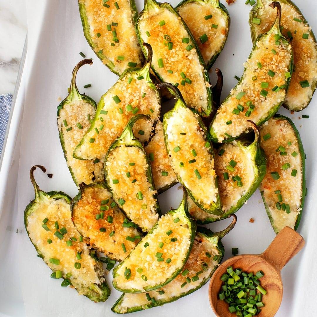 Baked jalapeno poppers on a sheet pan