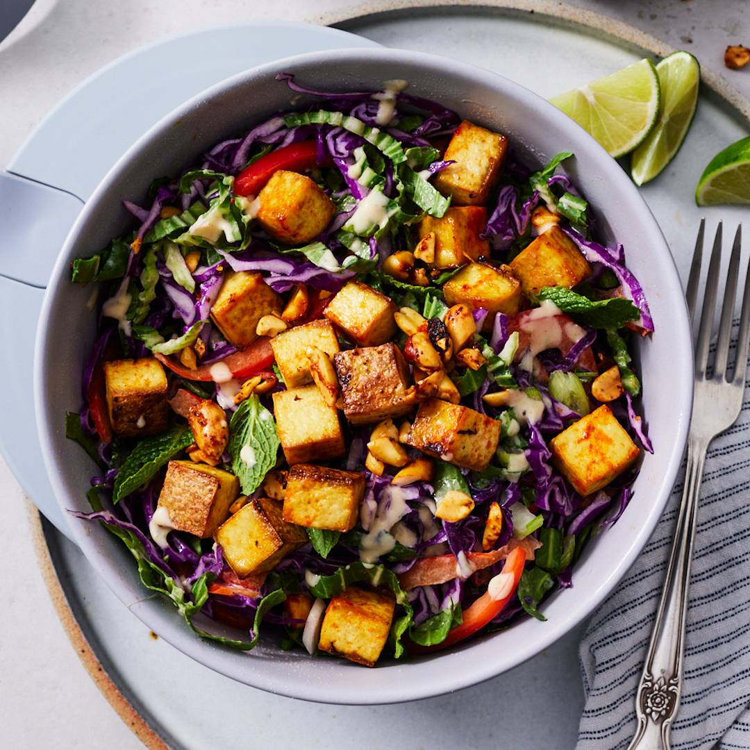 Coconut slaw with tofu and spicy peanuts