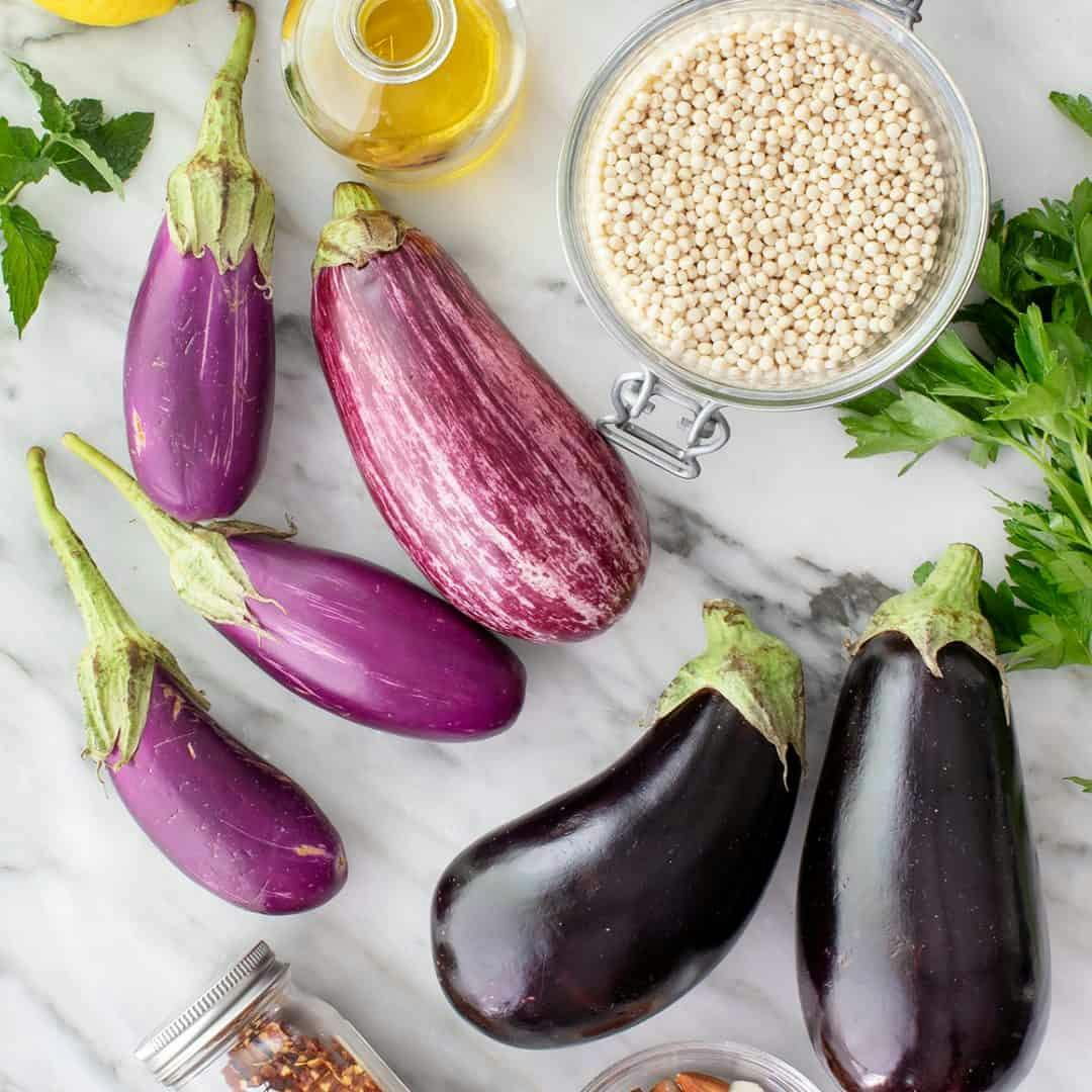 Eggplants, herbs, and dry couscous