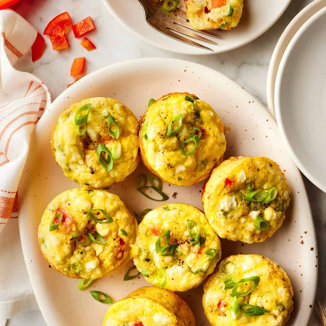 Breakfast egg muffins with scallions, feta, and bell peppers