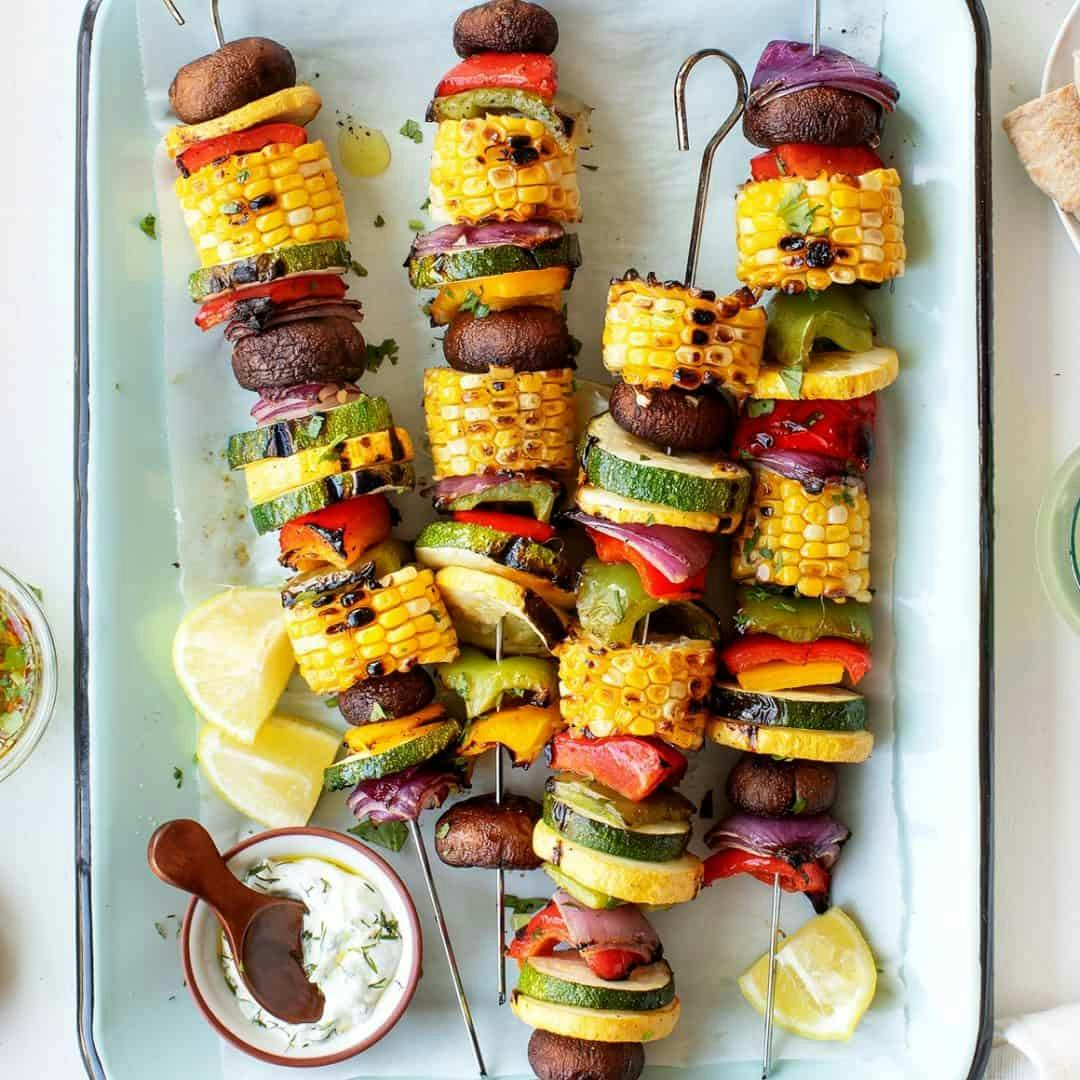 Grilled vegetable skewers on a tray