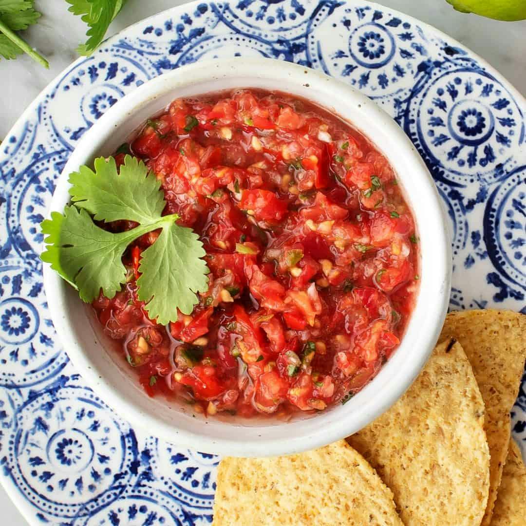 Bowl of fresh salsa with tortilla chips