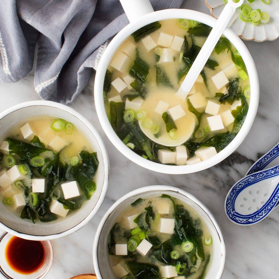 Pot and two bowls of miso soup